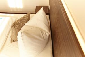 Postel nebo postele na pokoji v ubytování Hotel Prinzregent