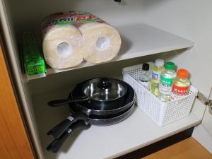 旅籠屋ゆいまーるにあるキッチンまたは簡易キッチン