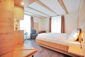 Letto o letti in una camera di Gasthaus zur Waldegg