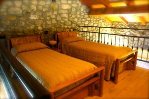 Postel nebo postele na pokoji v ubytování Locanda Ristorante Gavarini + 19 fotografií