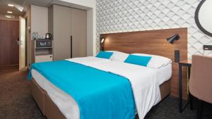 OREA Hotel Pyramida Praha客房内的一张或多张床位
