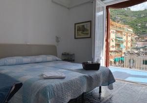 Postel nebo postele na pokoji v ubytování Hotel Europa