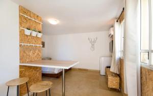 Rúm í herbergi á Designed Studio Apartment
