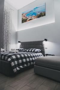 Ένα ή περισσότερα κρεβάτια σε δωμάτιο στο Terno su Napoli