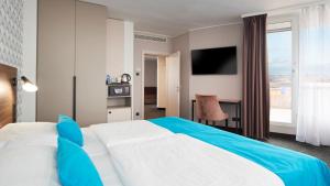 OREA Hotel Pyramida Praha客房内的一张或多张床位