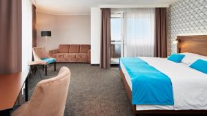 OREA Hotel Pyramida Praha客房内的一张或多张床位