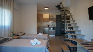 Katil atau katil-katil dalam bilik di Enalia Luxury Living