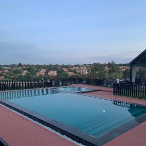 a large swimming pool on top of a house at Canvas Luxury Apartments in Johannesburg