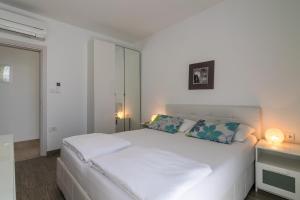 Postel nebo postele na pokoji v ubytování Villa Viviana Fažana Valbandon Heated pool