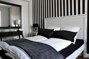 Säng eller sängar i ett rum på Maison Elise & Philipp