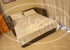 Voodi või voodid majutusasutuse Apartamento em Resort - Park toas