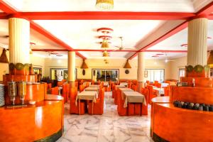 Restoran ili drugo mesto za obedovanje u objektu Palm Beach Hotel