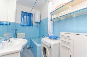 Koupelna v ubytování Apartment Buksa