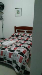Ліжко або ліжка в номері Chales do Antonio