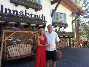 a man and a woman standing next to each other at Innsbruck Lodge in Mammoth Lakes