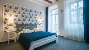 Ліжко або ліжка в номері Central Hotel