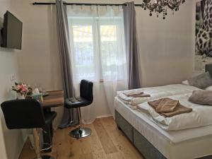 Katil atau katil-katil dalam bilik di Enjoyit Velden West