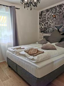 Katil atau katil-katil dalam bilik di Enjoyit Velden West
