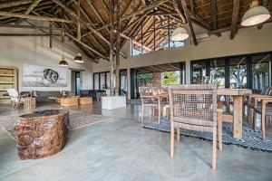 The lounge or bar area at Kruger Sunset Lodge