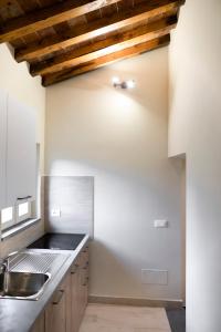 Kuchyň nebo kuchyňský kout v ubytování Il Palazzetto