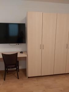 A television and/or entertainment centre at Apart welcom