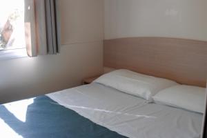 Postel nebo postele na pokoji v ubytování Camping Terrazzo sul mare