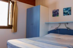 Postel nebo postele na pokoji v ubytování Camping Terrazzo sul mare