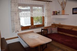 Predel za sedenje v nastanitvi Ferienwohnung Brugger