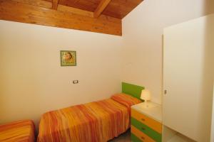 Postel nebo postele na pokoji v ubytování Camping Terrazzo sul mare
