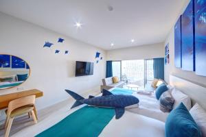 Телевизор и/или развлекательный центр в Royal View Hotel Churaumi