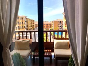 A balcony or terrace at El Mocan Luxury Apartment