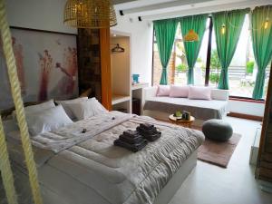 A bed or beds in a room at Oasi