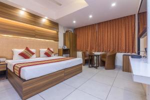 Postel nebo postele na pokoji v ubytování Rupam Hotel + 37 fotografií