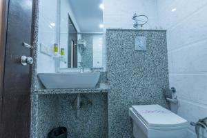Koupelna v ubytování Rupam Hotel