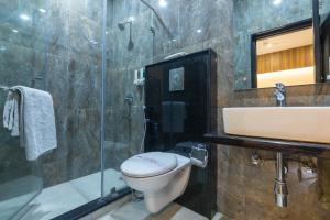 Koupelna v ubytování Rupam Hotel