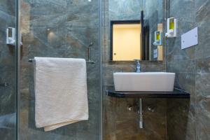 Koupelna v ubytování Rupam Hotel