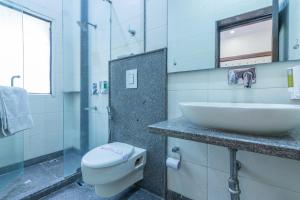 Koupelna v ubytování Rupam Hotel