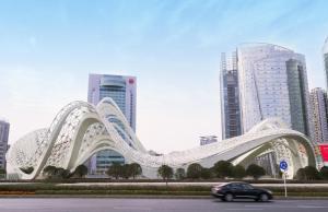 um carro passando por uma ponte branca numa cidade em Ramada Plaza Optics Valley Hotel Wuhan (Best of Ramada Worldwide) em Wuhan