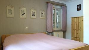 Postel nebo postele na pokoji v ubytování Villa Zeppelin - App Bergkristall