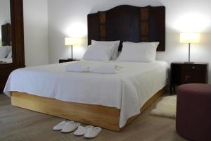Кровать или кровати в номере Aromas dos Salgueiros
