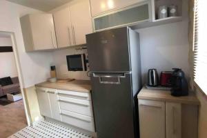 Η κουζίνα ή μικρή κουζίνα στο Coeur de Ville, Charmant 2 pieces, Parking/Wifi !