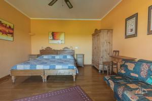 Postel nebo postele na pokoji v ubytování Villa Sant Anna