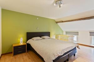 Un pat sau paturi într-o cameră la 't Verderf