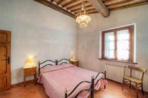Posteľ alebo postele v izbe v ubytovaní Agriturismo San Michele