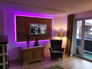Uma televisão e/ou sistema de entretenimento em Haus Pierzinger