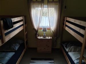 Кровать или кровати в номере Chrom Ranch Reiterhof