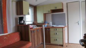 Kuchyň nebo kuchyňský kout v ubytování Mobil home au castellas marseillan