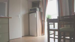 Kuchyň nebo kuchyňský kout v ubytování Mobil home au castellas marseillan