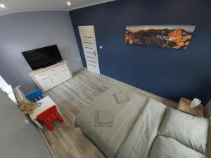 Telewizja i/lub zestaw kina domowego w obiekcie Apartament Na Franciszkańskiej