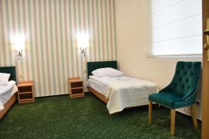 Cama o camas de una habitación en Pokoje Gościnne DACPOL